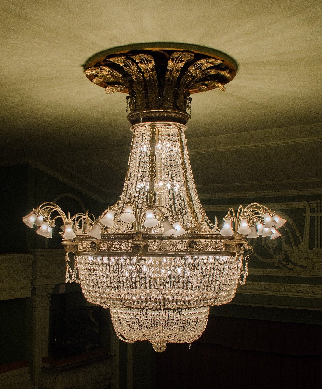 Chandelier installation in London with secure ceiling mounting