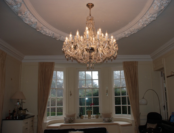 Chandelier installed neatly in London with clean ceiling finish